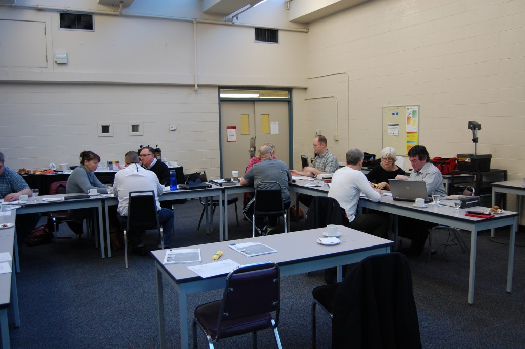 Image of Instructors at tables
